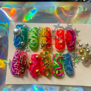 Taste the rainbow with a dragon force press on square medium length nails